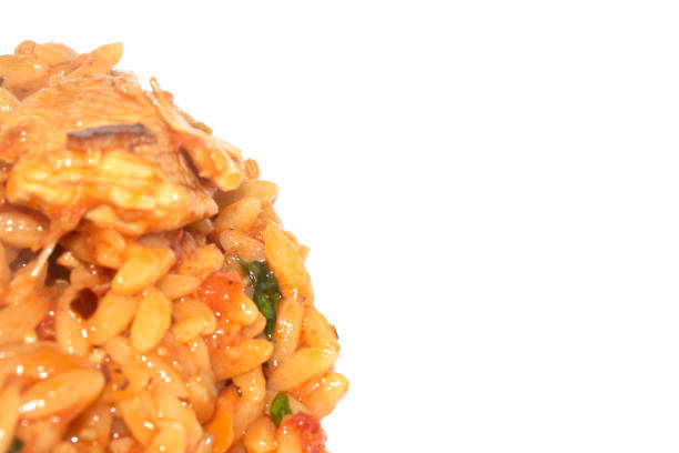 Close Up of Tomoto Based Orzo Rice Sauce Dinner Snack Dish on a White Background
