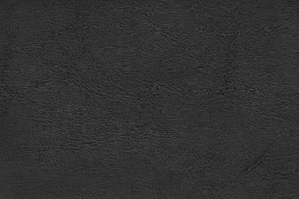 istock Natural, genuine black leather texture, structure of matte leatherette macro background 2193591289