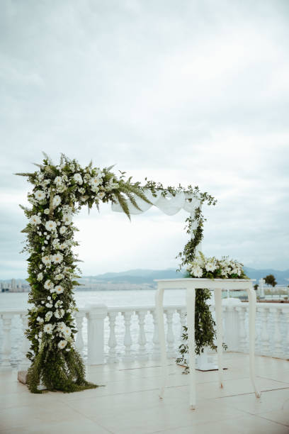 istock Beautiful wedding arch by the sea 2193591346