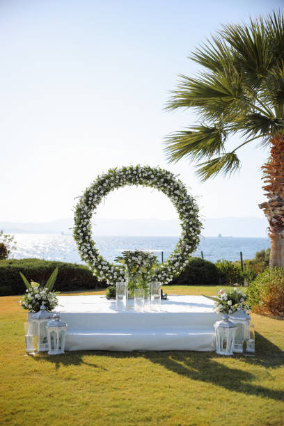 istock Beautiful wedding arch on the beach 2193592134