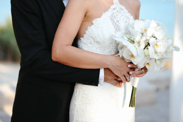 istock Bride and groom outdoors on a wedding day 2193592354