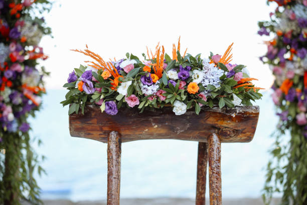 Romantic wedding ceremony. Beautiful setting for outdoors wedding ceremony waiting for bride and groom and guests. Decoration