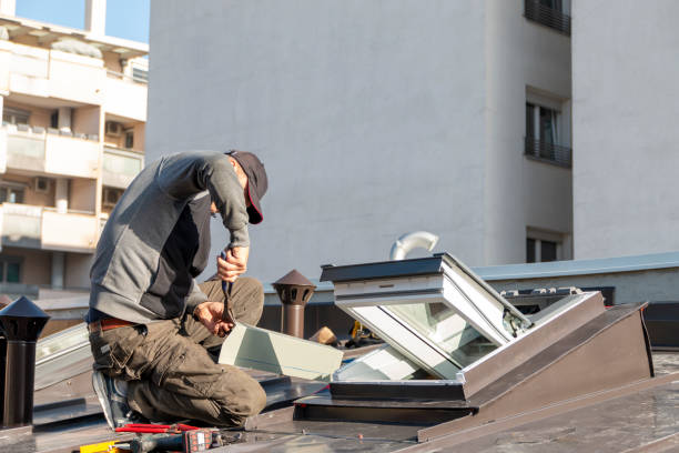 istock A roofer builder worker finishing folding a metal sheet using special pliers with a large flat grip. 2193596023