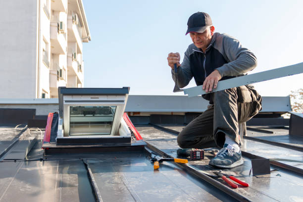 istock A roofer builder worker finishing folding a metal sheet using special pliers with a large flat grip. 2193596024
