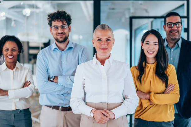 istock Confident businesswoman and her team. 2193606600