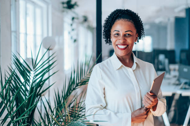 istock Confident businesswoman in modern office. 2193606644