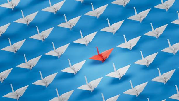 istock Different business concept.new ideas. paper art style. creative idea. red leader swan, standing out from the crowd of white swans.3D rendering on blue background. 2193607049
