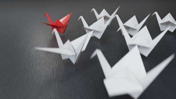 istock Different business concept.new ideas. paper art style. creative idea.leader swan concept using red paper swan among white swans.3D rendering on black background. 2193607062