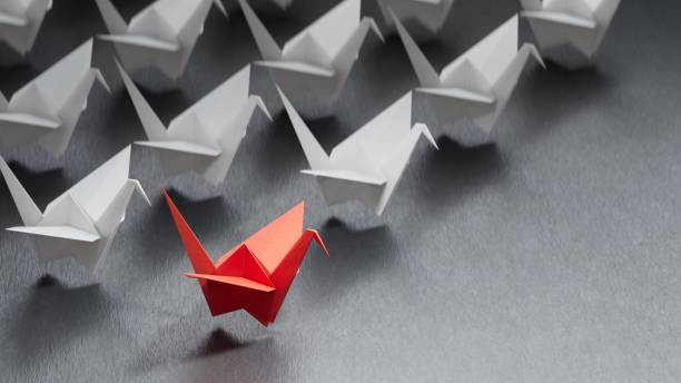 istock Different business concept.Red paper swan changing direction from white paper swan. new ideas. paper art style. creative idea.3D rendering on black background. 2193607064
