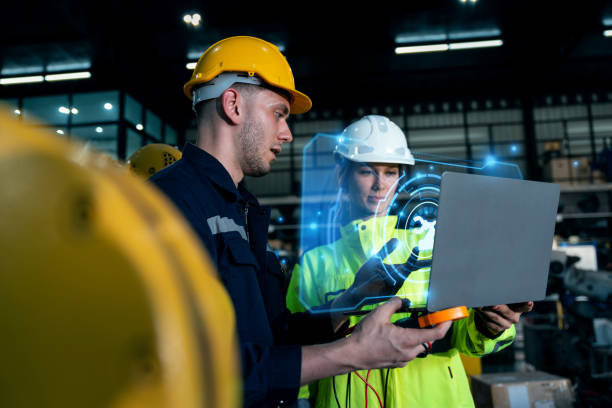 istock Professional engineer or programmer check robotic arm with AI tool in factory lab, specialist job and smart factory technology concept 2193608198