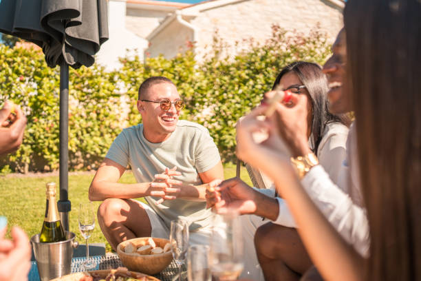 istock Diverse Friends Enjoying Fun at the Villa Pool 2193608245