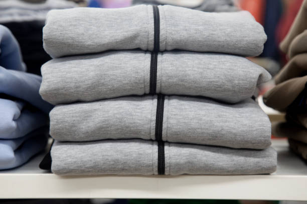 Colorful Cashmere Sweaters Hanging Retail Display Full Frame