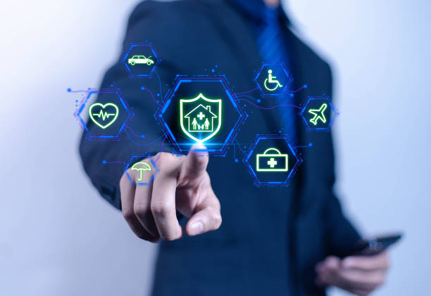 istock Insurance concept. Businessman using laptop with digital icons representing different types of insurance such as health, home, car, travel, comprehensive coverage and policy management. 2193618699