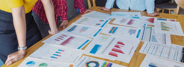 istock Banner Business strategy team report chart, graph, infographic data analyze financial report plan. Banner Hands team partner planning market finance statistics sale excel spreadsheet with copy space 2193621152