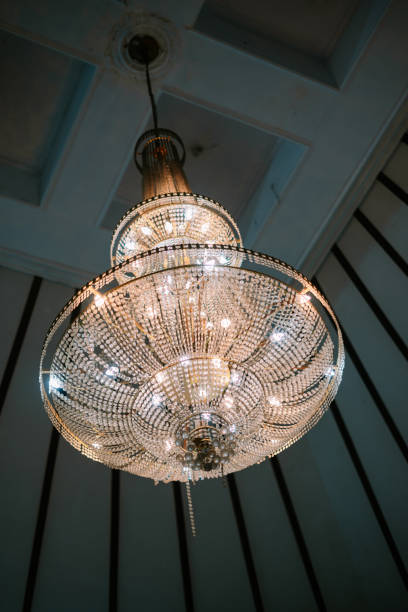 istock A magnificent crystal chandelier illuminates a high-ceilinged room 2193623507