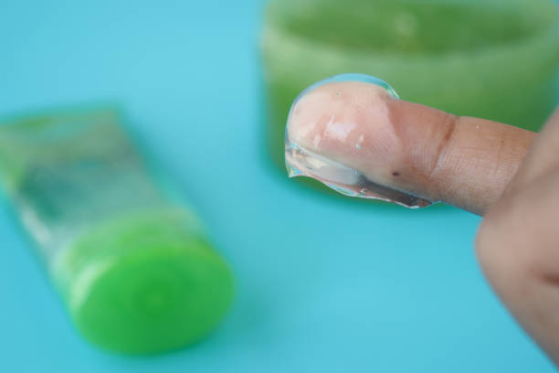 istock Fresh aloe vera sliced and liquid gel in plastic container on white background 2193623772