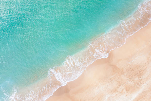istock Ocean waves and beach top view, natural background. 2193624460