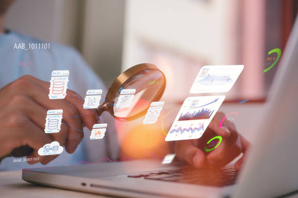 istock businessman use computer laptop and holding magnifying glass looking at virtual diagram in concept of ai technology development, intelligent network, advancement artificial intelligence 2193626378