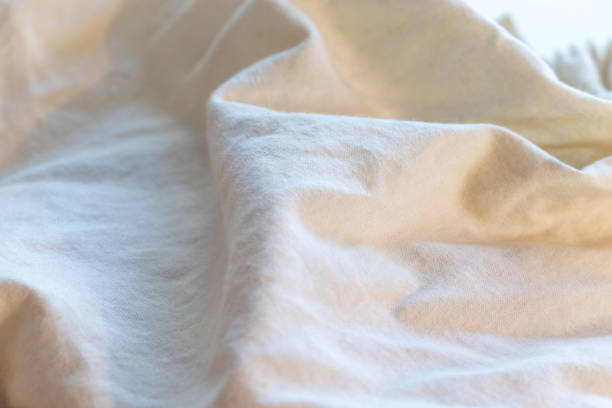 istock Texture of crumpled white cloth 2193630703