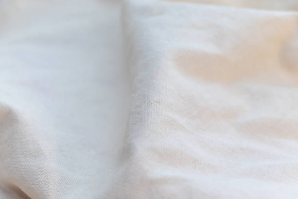 istock Texture of crumpled white cloth 2193630711
