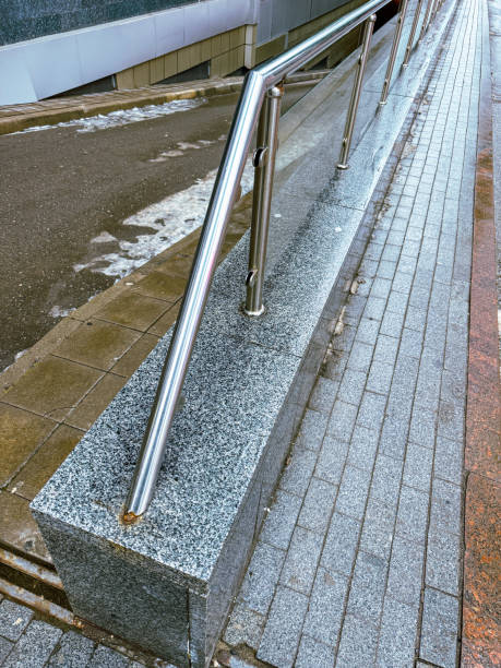 istock A metal railing is on a brick wall 2193636919