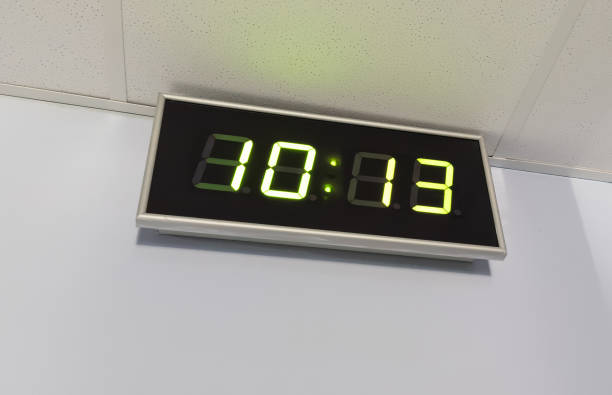 istock Black digital clock on a white background showing time 10 13 Secure Internet Day 2193637917