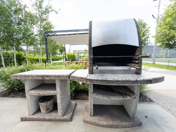 istock Outdoor BBQ grill. Barbecue open fireplace for cooking 2193639840