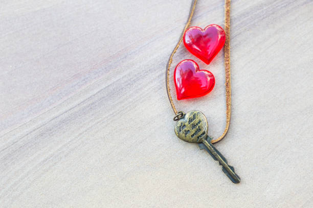Red heart with heart shape on sandstone background, valentine background idea, love and romance