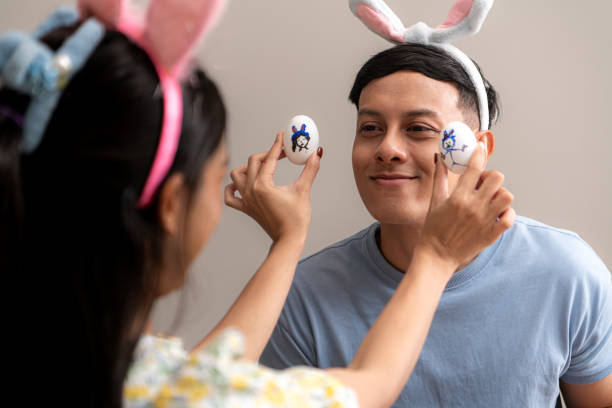 istock A young couple is designing and painting Easter eggs on Easter 2193642030