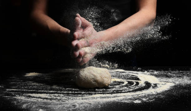 istock The cook is kneading the dough 2193642420