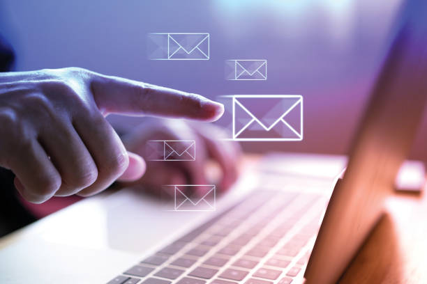 istock Male hand with laptop in room is sending customer email or job application on internet, modern world working concept. 2193643542