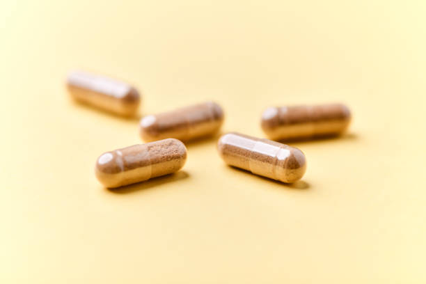 istock Carnitine capsules. Concept for a healthy dietary supplementation. Bright background. Soft focus. Close up. 2193644309