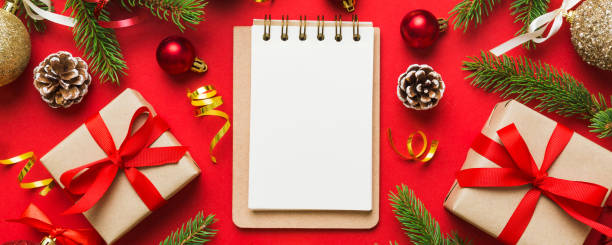 istock Christmas blank greeting card mock-up scene. Creative layout made of Christmas tree branches and paper card note. Flat lay. Nature New Year concept 2193644675