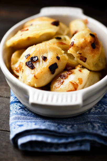 istock Dumplings with potato and cottage cheese stuffing (pierogi) 2193645024