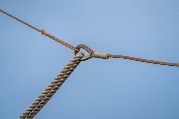 steel and rope cables of a shrimp ship on the high seas