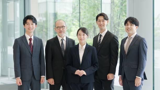 istock Asian business person standing with a smile 2193646049