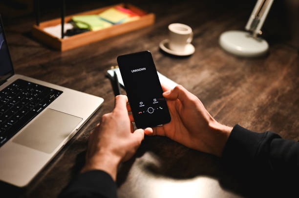 istock Whistleblowing concept. Scam alert on mobile phone 2193651153