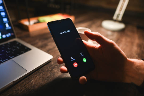 close up of unknown incoming call on mobile phone.