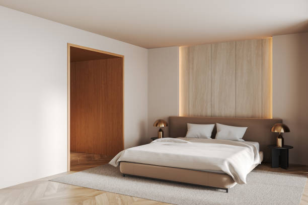 istock Minimalist bedroom with cozy lighting and modern decor. 3D Rendering 2193652019