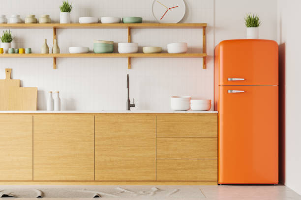 istock Modern kitchen interior with wooden cabinets and orange retro fridge. 3D Rendering 2193652996