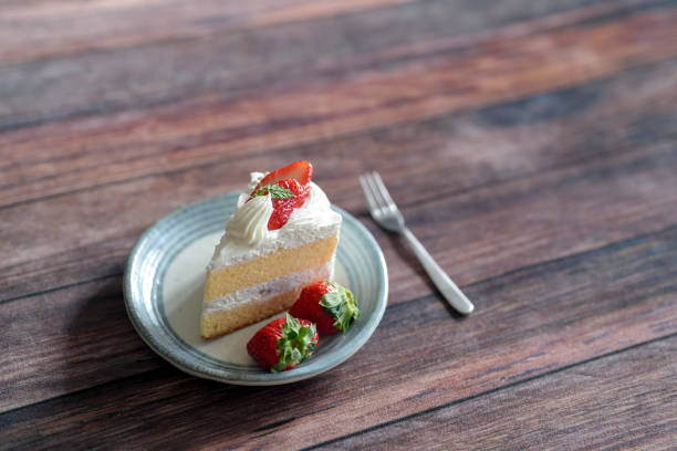 A strawberry cake is a delightful dessert that combines the sweet and slightly tart flavor of fresh strawberries with a light, moist cake. This cake typically features layers of fluffy vanilla or strawberry-flavored sponge, which are filled and topped with a luscious strawberry buttercream or whipped cream. Often, fresh strawberries are used both within the layers and as a decorative topping, adding bursts of juicy freshness. The cake might also include a strawberry compote or jam layer for extra depth of flavor. Perfect for any celebration, a strawberry cake offers a beautiful, vibrant presentation and a taste that captures the essence of summer.