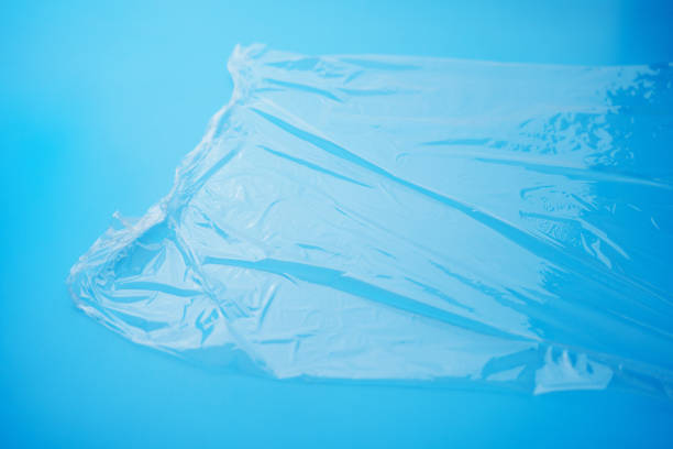 istock Transparent stretch film for packaging on a blue background. 2193656510