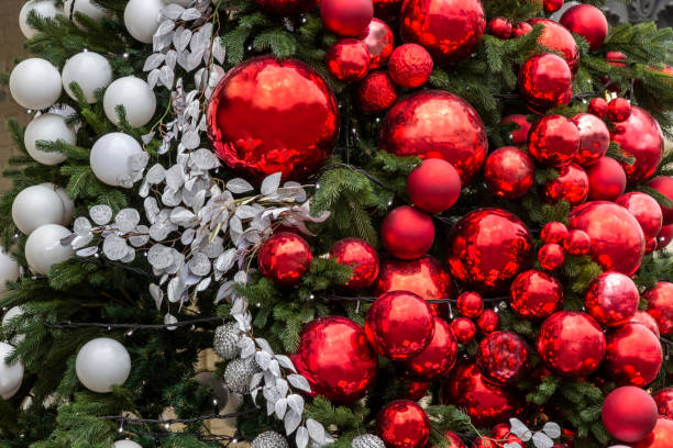 istock Red and white balls among fir branches. New Year's composition 2193656536