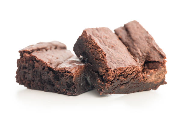 istock Homemade chocolate brownies isolated on white background. 2193661560