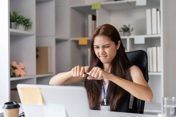 istock Frustrated Office Worker Struggling with Stress and Overload in a Modern Workplace Environment 2193666161