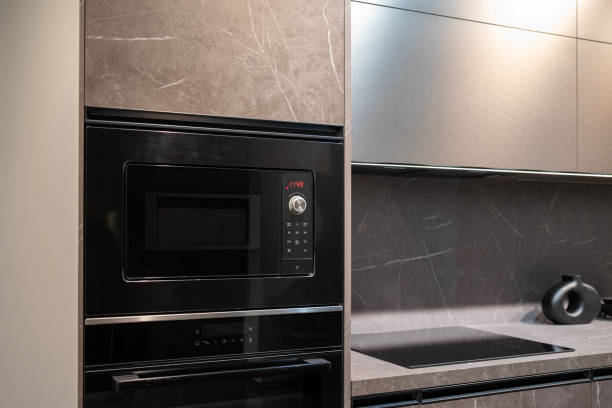 istock Black built-in microwave oven in kitchen furniture 2193666917