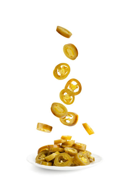 Falling Pickled Jalapeno Pile Isolated, Flying Marinated Green Jalapenos, Hot Mexican Pepper