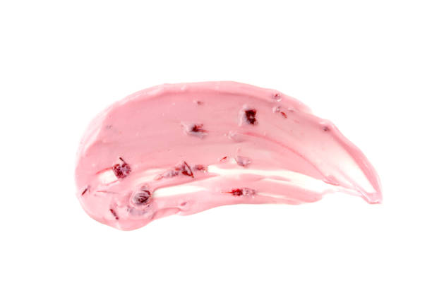 istock Yogurt smear isolated, white yoghurt with cherry jam splash, pink milk pudding splatter, dairy food 2193668271