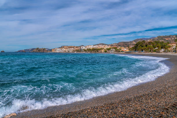 Mediterranean blue sea and waves Almunecar beach Spain Costa del Sol Andalusia