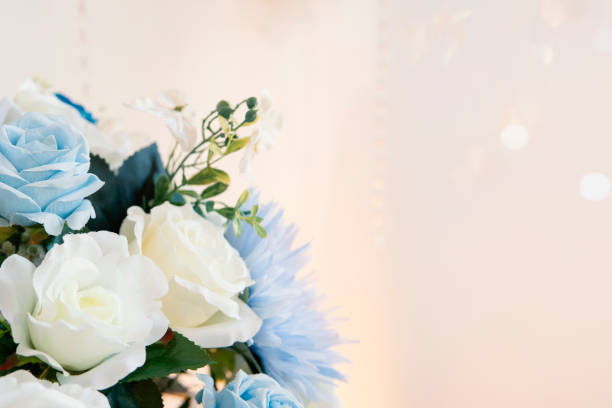 istock Bouquet roses flower and peonies spring romantic wedding invitation a pastel background. Floral arrangements pink white light elegant beauty to a mother's day card. 2193672208